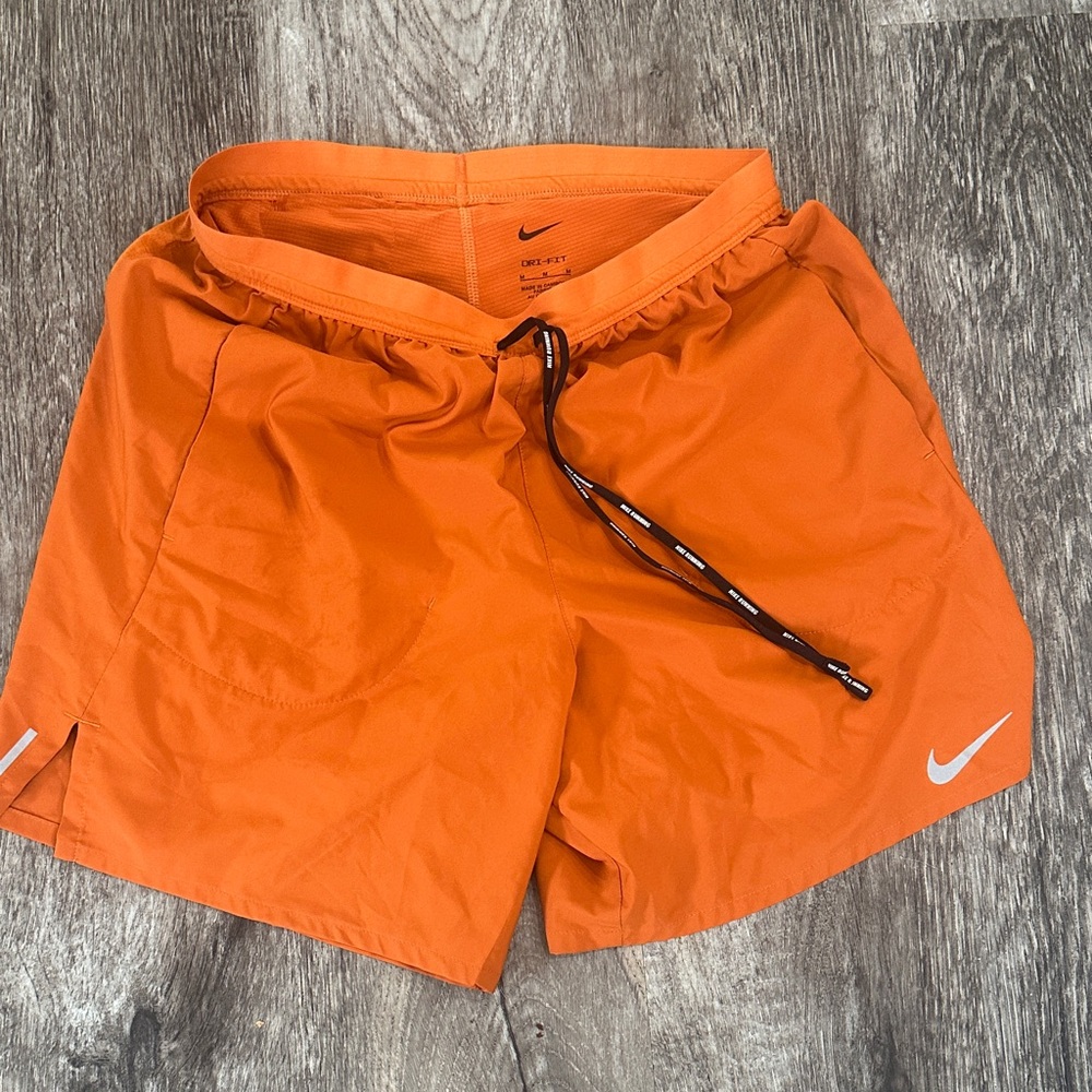 Men’s Nike running shorts size medium.